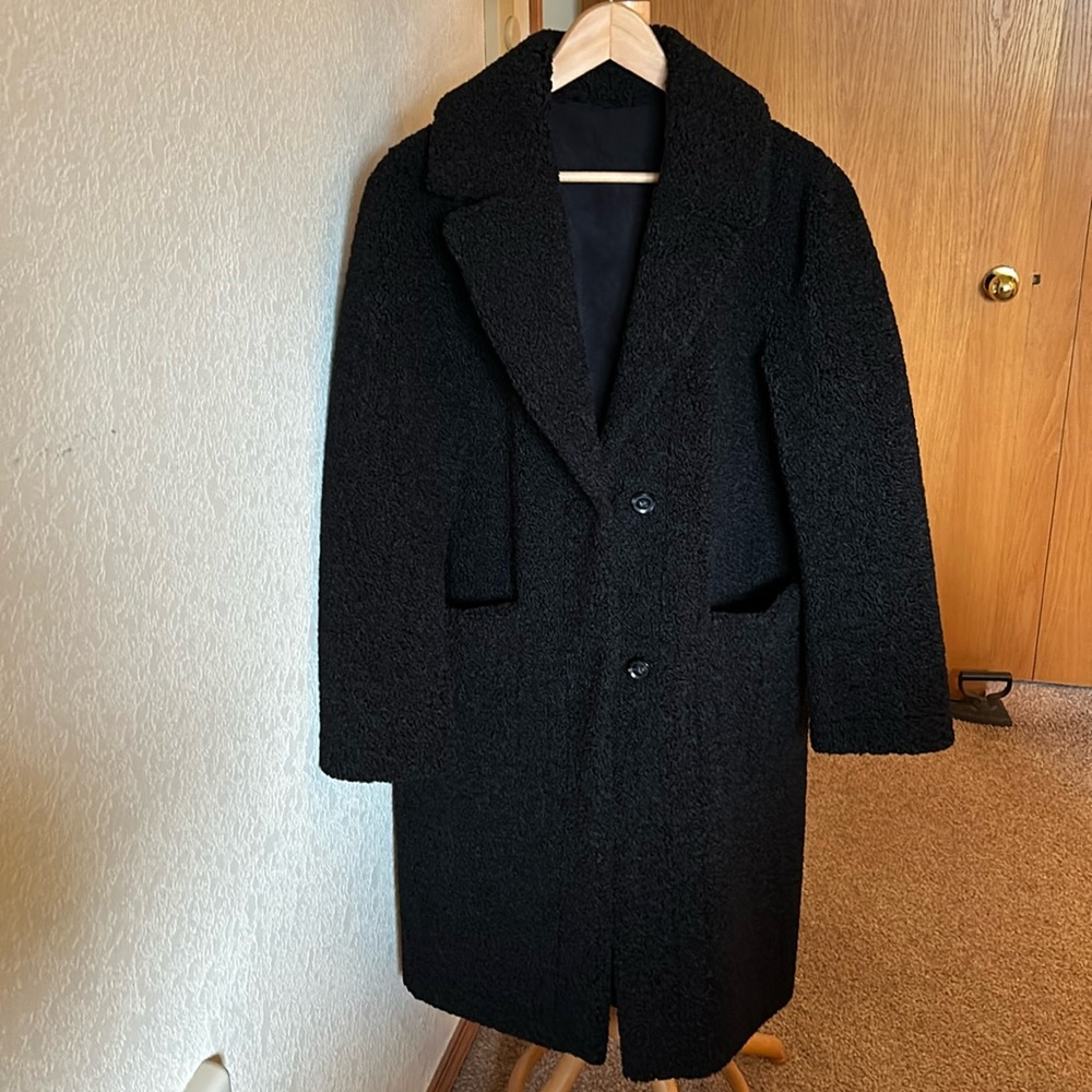 Women’s coat. shearling like fabric outside, super soft sueded interior.